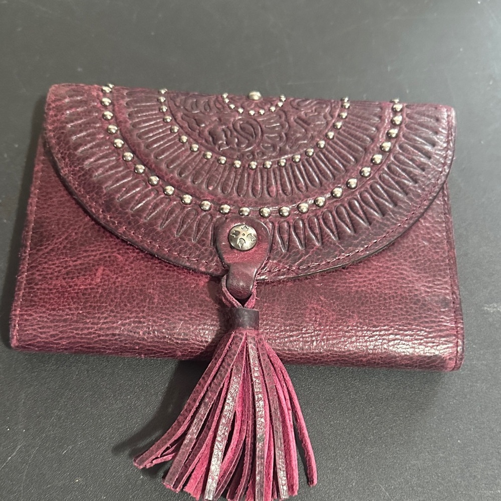 Patricia Nash Colli burgundy distressed studded leather trifold wallet.